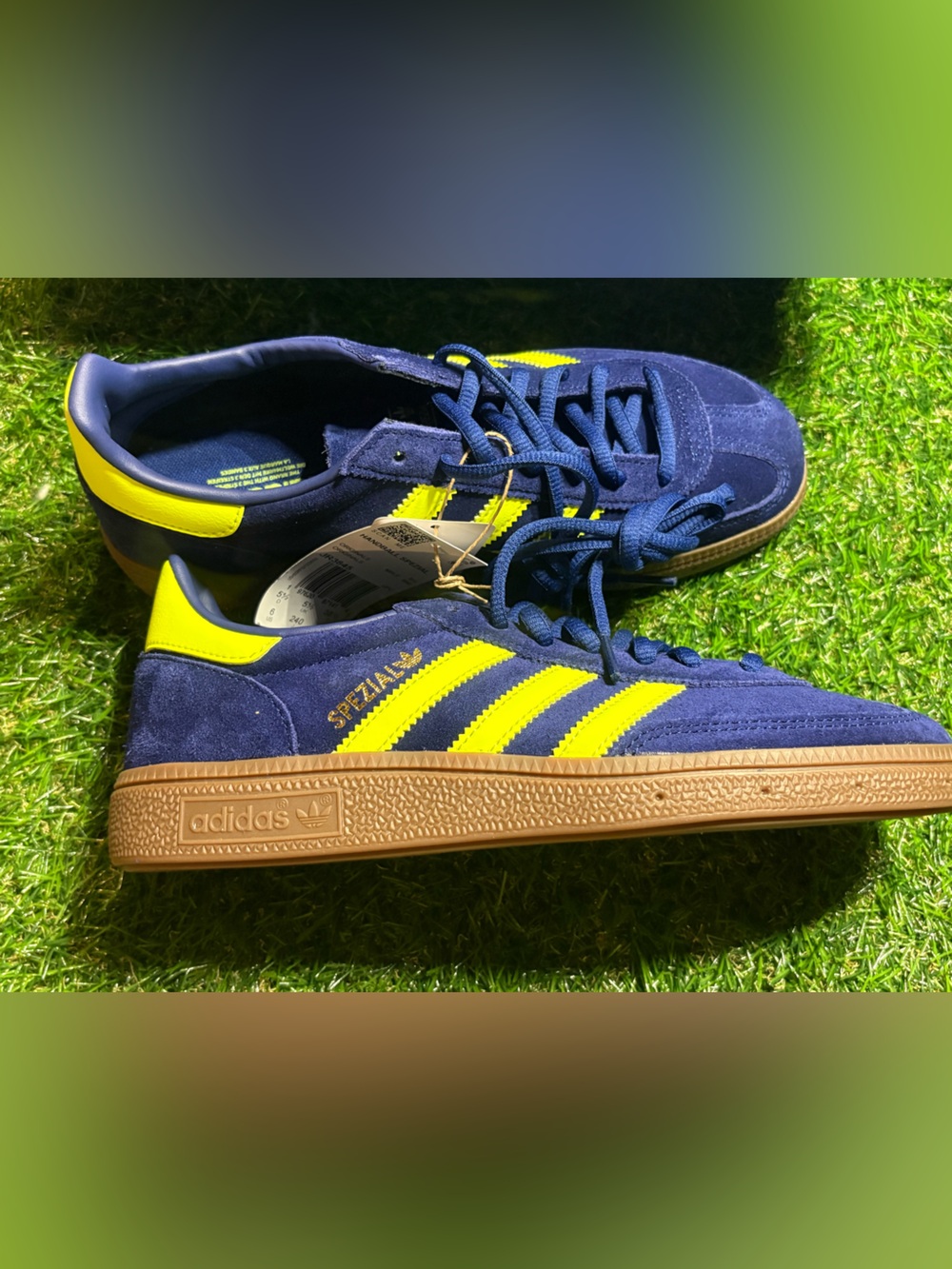 adidas navy suede sneakers with yellow stripes